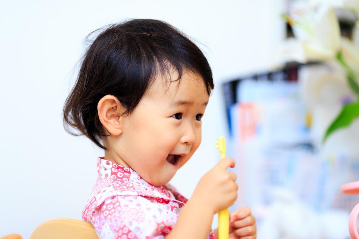 baby brushing teeth