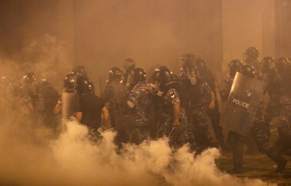 Police officers are seen during a Beirut protest days after the blastReuters