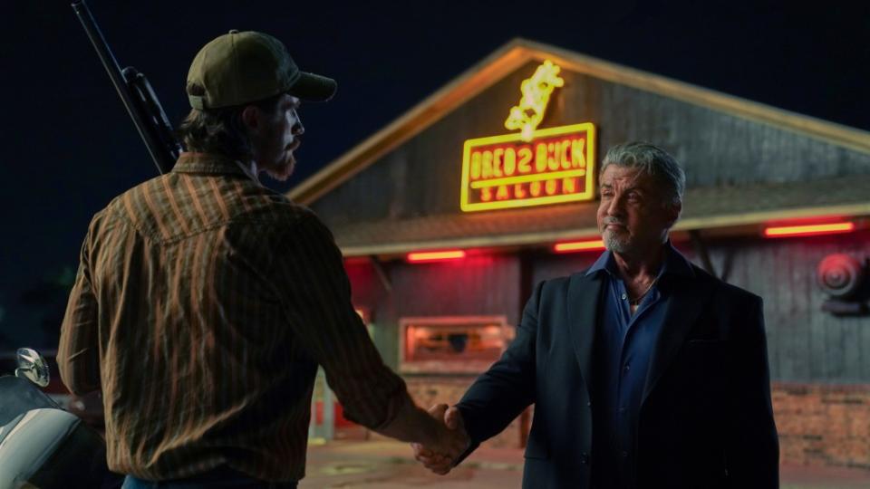 Garett Hedlund as Mitch Keller and Sylvester Stallone as Dwight "The General" Manfredi of the Paramount+ original series TULSA KING. Photo Cr: Brian Douglas/Paramount+. © 2022 Viacom International Inc. All Rights Reserved.