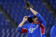 South Korea's Minwoo Kim leaves the team's baseball game against the United States in the seventh inning at the 2020 Summer Olympics, Saturday, July 31, 2021, in Yokohama, Japan. (AP Photo/Sue Ogrocki)