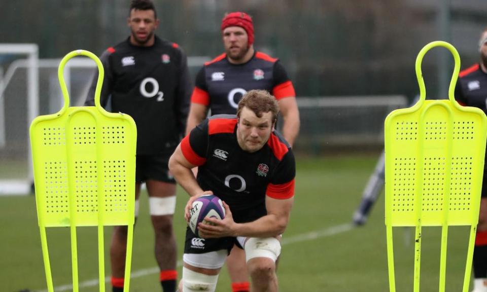 Joe Launchbury hones his ball-carrying skills during an England training session at Latymer Upper School. 