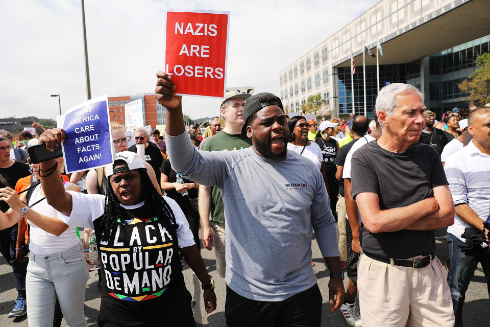 <p>Thousands of protesters march in Boston against a planned ‘Free Speech Rally’ just one week after the violent ‘Unite the Right’ rally in Virginia left one woman dead and dozens more injured on Aug. 19, 2017 in Boston, Mass. (Photo: Spencer Platt/Getty Images) </p>