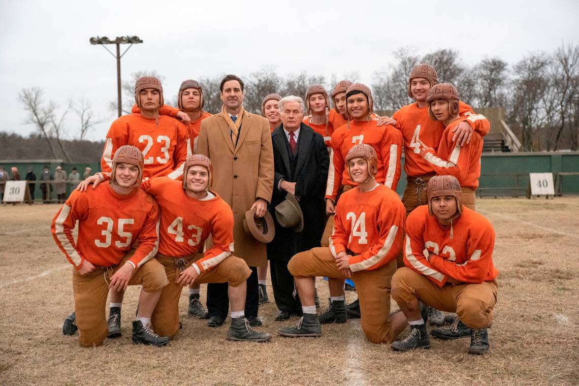 Luke Wilson and Martin Sheen (in jackets, left to right), star in “12 Mighty Orphans,” a 2021 film that tells the story of Fort Worth’s Masonic Home Mighty Mites football team in the 1930s.