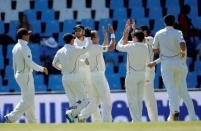 Cricket - New Zealand v South Africa - second cricket test match - Centurion Park, Centurion, South Africa - 28/08/2016. New Zealand's cricket players celebrate the dismissal of South Africa's Temba Bavuma after he was caught out by New Zealand's Doug Bracewell.REUTERS/Siphiwe Sibeko