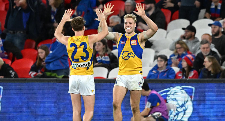Seen here, West Coast celebrate their stunning upset win over the Western Bulldogs.