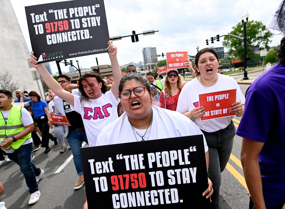 Demonstrators yell as they march to the Capitol to participate in The People vs The State of Tennessee Rally Wednesday, April 17, 2024, in Nashville, Tenn. The Equity Alliance, along with more than a dozen other grassroots groups from Nashville and around the state, held a rally in response to what organizers call “an ineffective legislative session” happening in Tennessee.