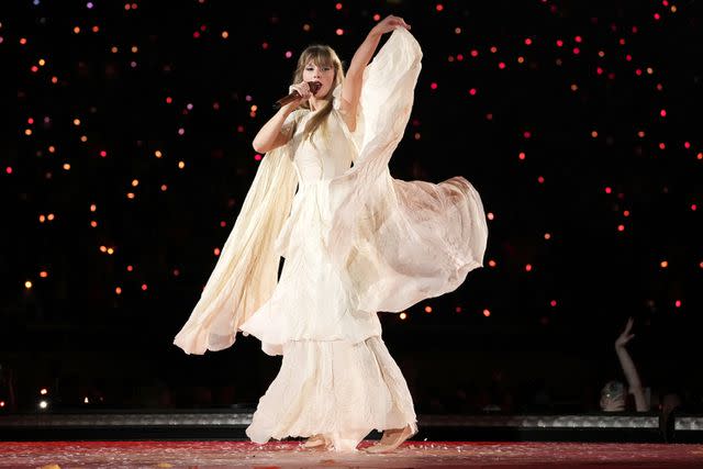 Kevin Mazur/Getty Taylor Swift performing onstage during the Eras Tour at State Farm Stadium on March 18, 2023 in Swift City, ERAzona (Glendale, Arizona).