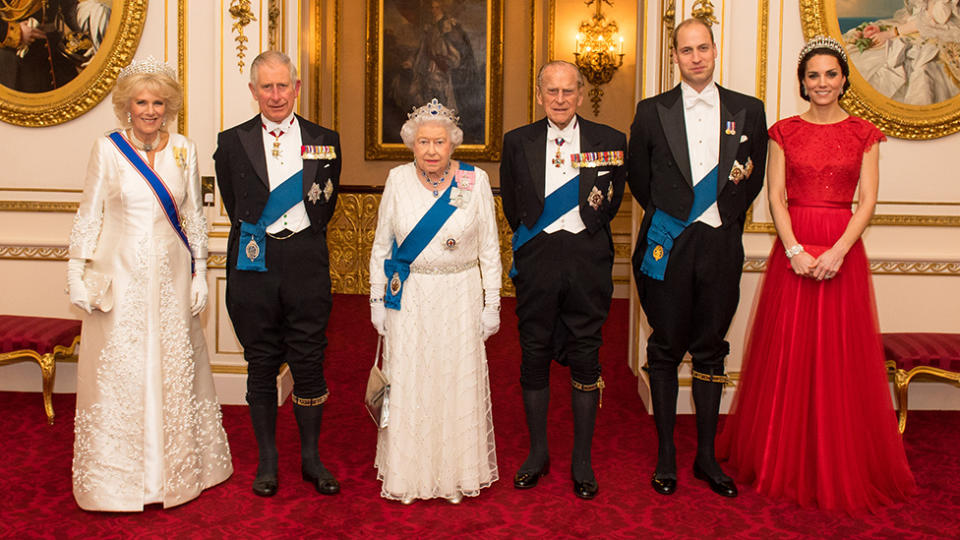 Camilla, Kate and the Queen are all pictured wearing tiaras here at the annual evening reception for the Diplomatic Corps in 2016. Photo: Getty