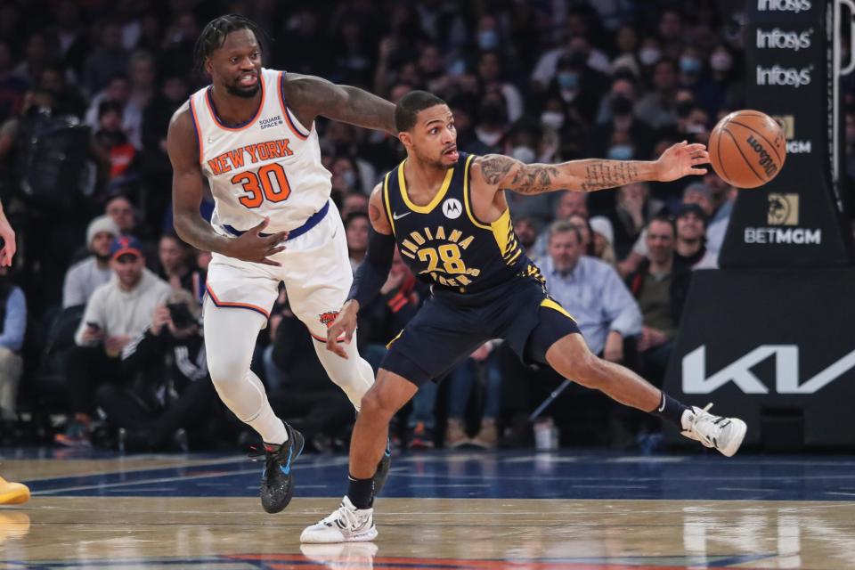 Jan 4, 2022; New York, New York, USA;  Indiana Pacers guard Keifer Sykes (28) knocks the ball away from New York Knicks forward Julius Randle (30) in the first quarter at Madison Square Garden. Mandatory Credit: Wendell Cruz-USA TODAY Sports