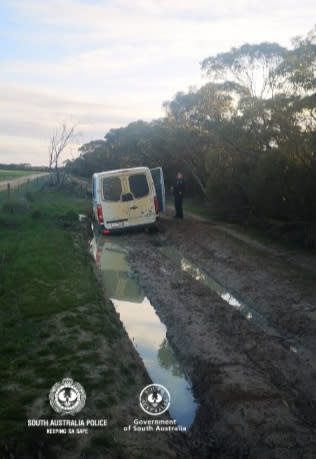 The van used by two men to cross the Victoria-South Australia border bogged on a dirt road. Source: South Australia Police