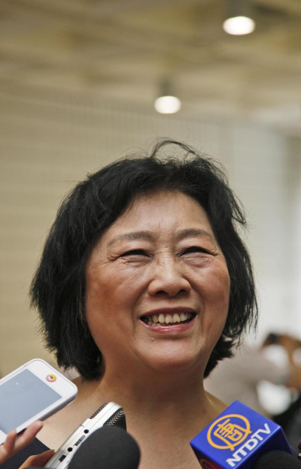 In this June 9, 2012 photo, Chinese journalist Gao Yu, who was imprisoned for nearly 6 year in the 1990s on charges of leaking state secrets, speaks to the media during an opening ceremony of Chinese artist Liu Xia's photo exhibition in Hong Kong. Prominent Chinese journalist Gao Yu has been "criminally detained" just weeks ahead of the 25th anniversary of the Tiananmen Square crackdown for allegedly leaking state secrets to a foreign news site, the state news agency Xinhua reported Thursday, May 8, 2014. (AP Photo/Kin Cheung)