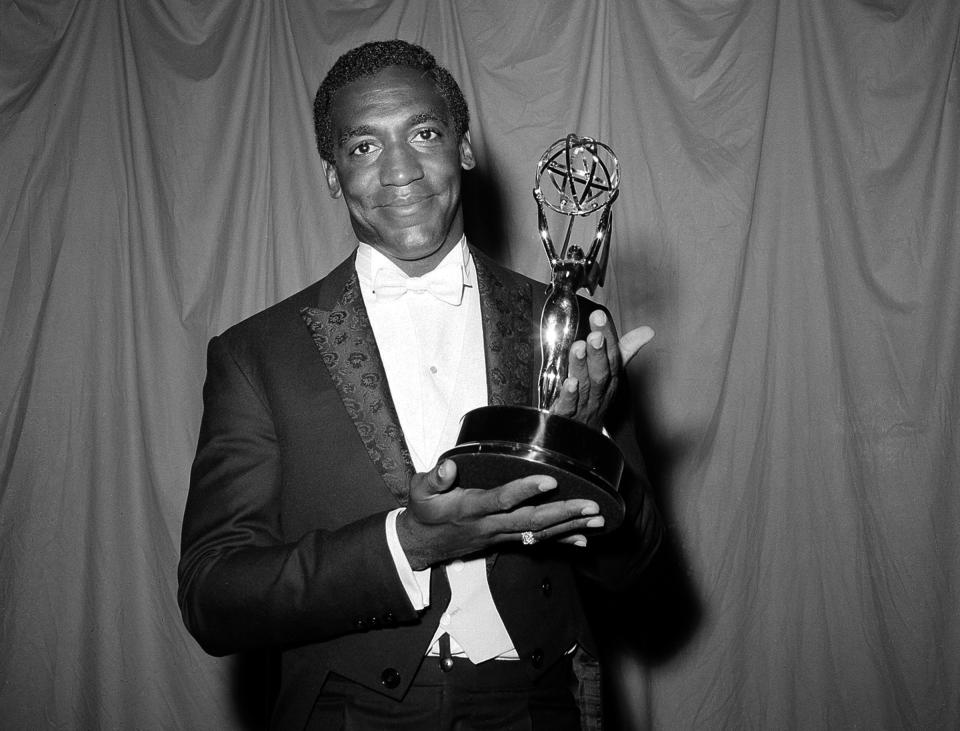 FILE - In this May 22, 1966 file photo, actor and comedian Bill Cosby poses with his award for best actor in a TV series for his role in "I Spy," at the Emmy Awards in New York. Cosby is facing the start of a sentencing hearing on Monday, Sept. 24, 2018, at which a judge will decide how to punish the 81-year-old comedian who was convicted in April of drugging and sexually assaulting former Temple University athletics employee Andrea Constand at his suburban Philadelphia home in 2004. (AP Photo, File)