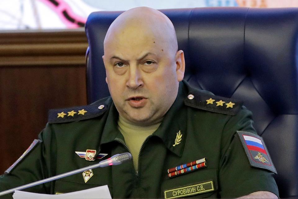 Colonel General Sergei Surovikin, Commander of the Russian forces in Syria, speaks, with a map of Syria projected on the screen in the back, at a briefing in the Russian Defense Ministry in Moscow, Russia, Friday, June 9, 2017. Russia's Defense Ministry announced that air force chief, Gen. Sergei Surovikin, would be the commander of all Russian troops fighting in Ukraine. The statement marked the first official appointment of a single commander for the entire Russian force in Ukraine.