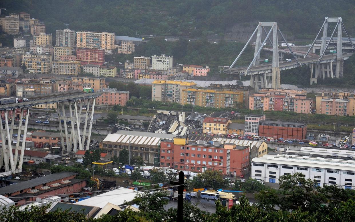 The collapsed Morandi Bridge is seen in the Italian port city of Genoa - REUTERS