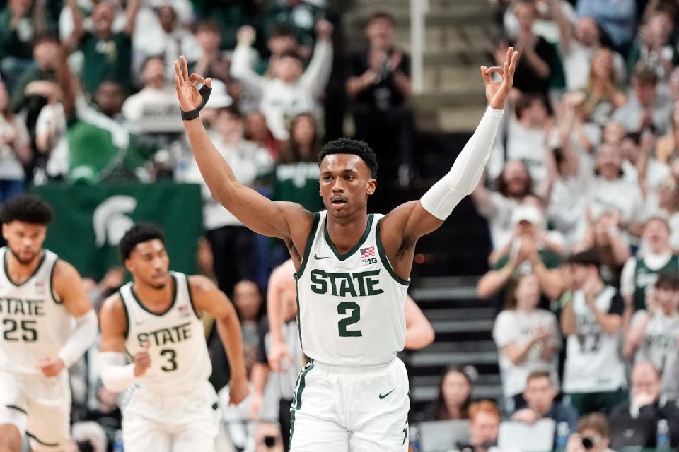Michigan State guard Tyson Walker (2) reacts after a 3-point basket during the first half against Iowa at Breslin Center in East Lansing on Feb. 20, 2024.