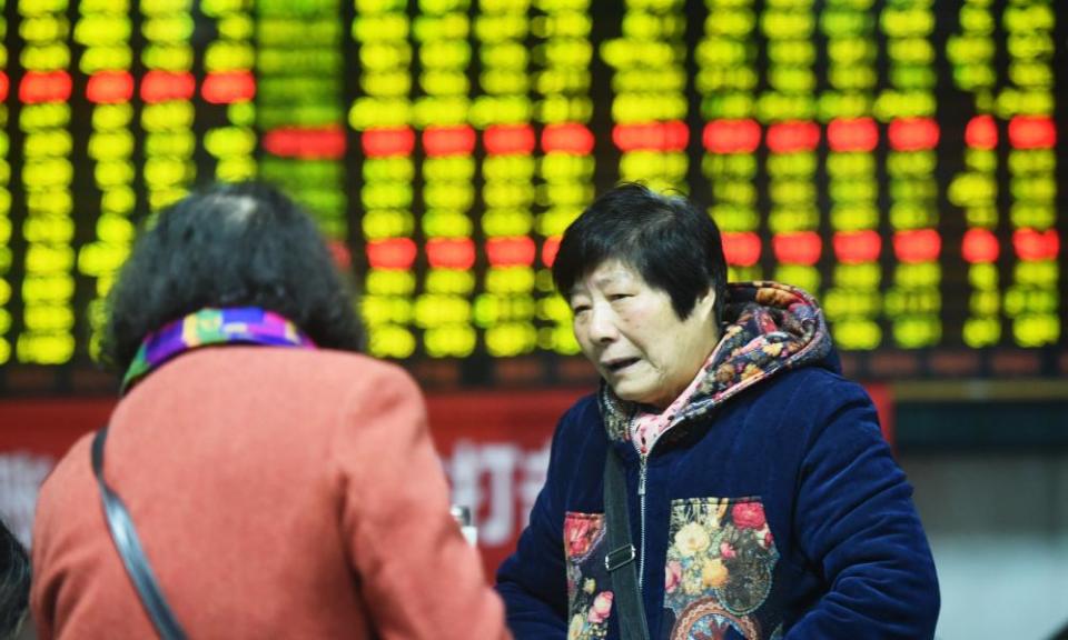 Investors at a stock exchange hall in Hangzhou, Zhejiang province, China.