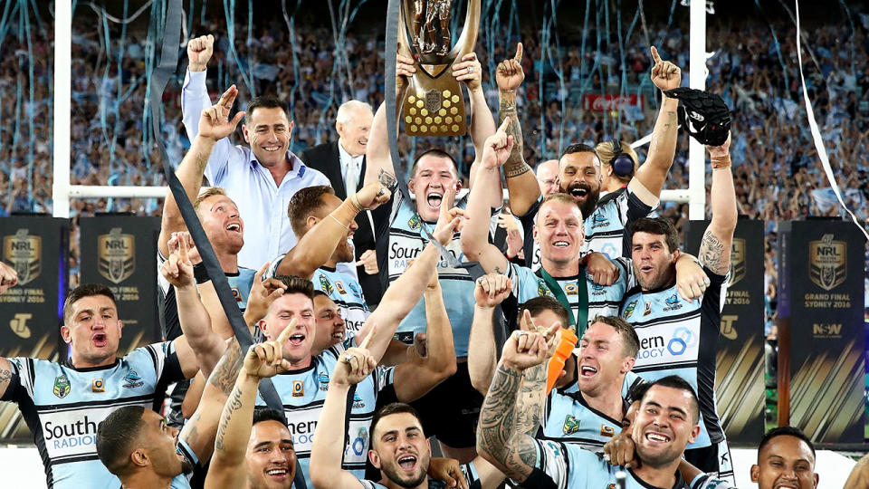 The Sharks celebrate with the Premiership Trophy in 2016. (Photo by Mark Kolbe/Getty Images)