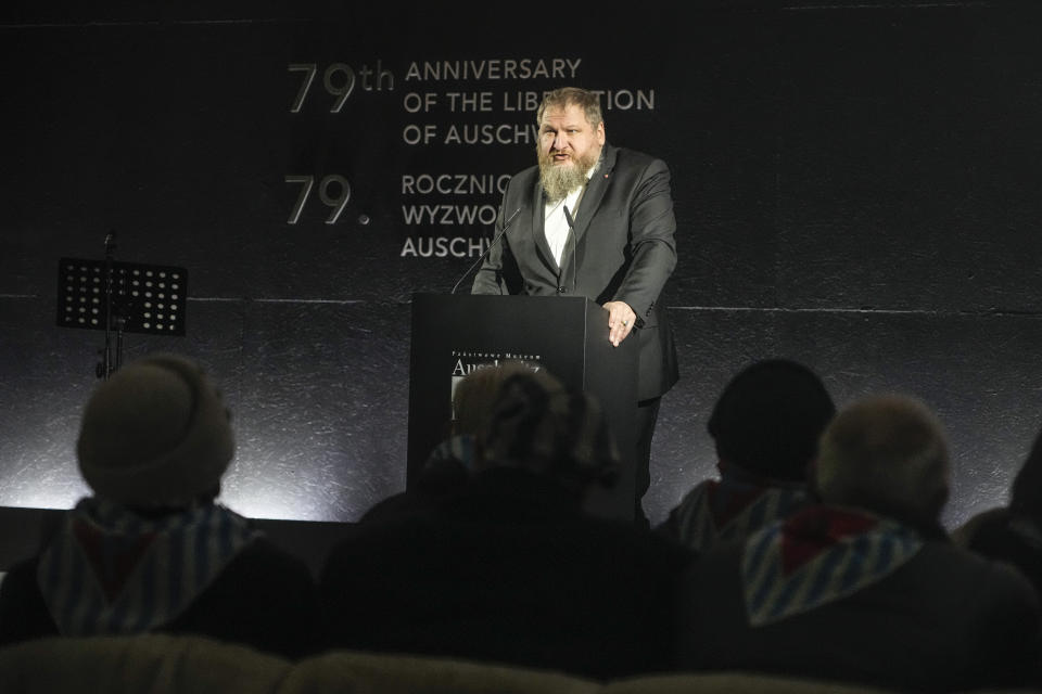 Director of the Auschwitz museum Piotr Cywinski speaks during a ceremony at the Birkenau Nazi death camp in Oswiecim, Poland, Saturday, Jan. 27, 2024. Survivors of Nazi death camps marked the 79th anniversary of the liberation of the Auschwitz-Birkenau camp during World War II in a modest ceremony in southern Poland.(AP Photo/Czarek Sokolowski)