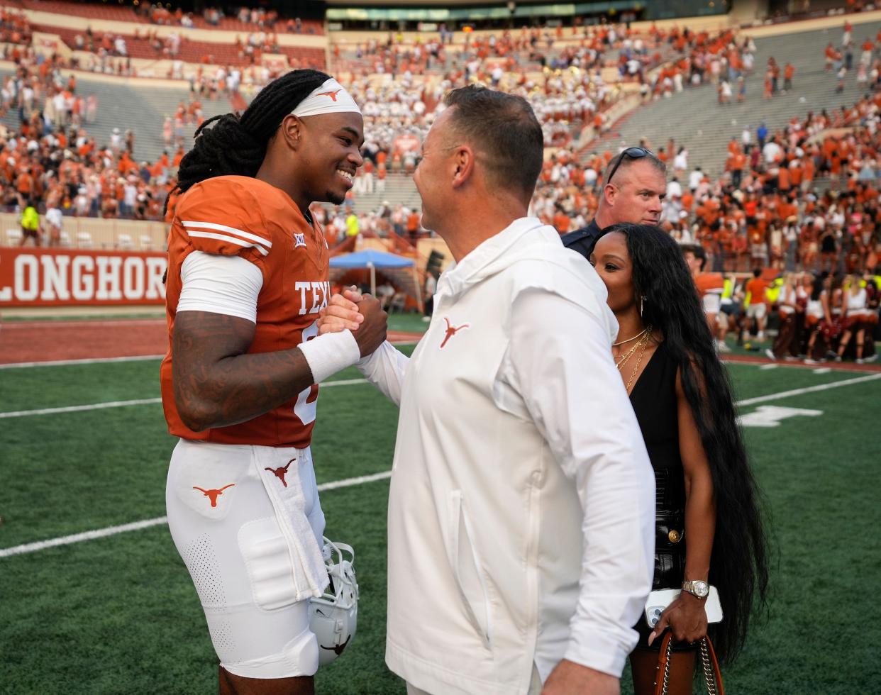 Texas head coach Steve Sarkisian congratulates quarterback Maalik Murphy after the Oct. 28 win over Kansas State. This has been a big month for both: Sarkisian signed an impressive recruiting haul that's the nation's No. 3 class heading into national signing day and Murphy has transferred to Duke, where he'll probably start.