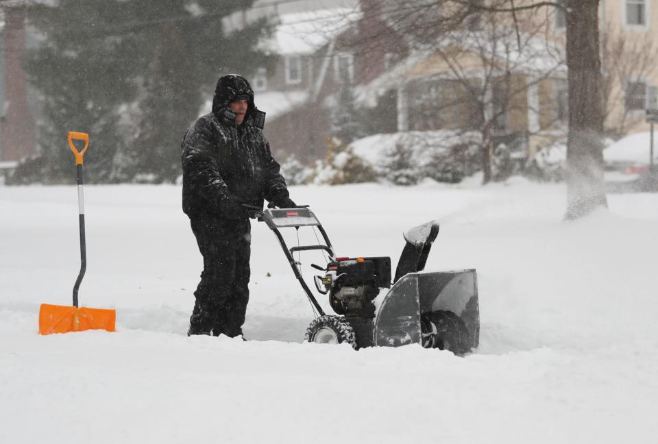 Robert Arone uses a snowblower to clear the snow from his driveway in Sloatsburg on Thursday, December 17, 2020. 