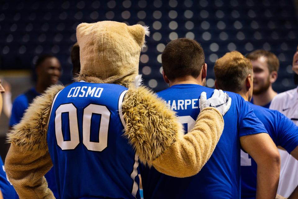 Cosmo puts his arm around Mitch Harper during a basketball game played at Media Madness, an event hosted by the BYU men’s basketball program, at the Marriott Center in Provo on Monday, Oct. 9, 2023. | Megan Nielsen, Deseret News