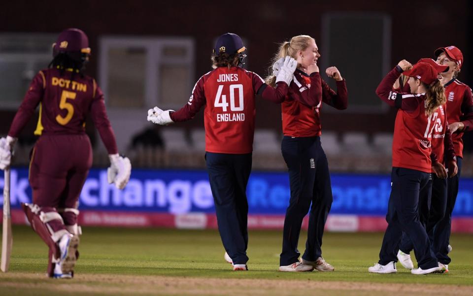 Sarah Glenn of England celebrates dismissing Deandra Dottin of the West Indies - GETTY IMAGES