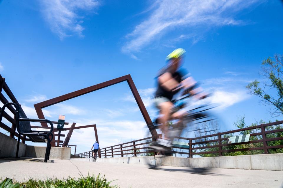 The High Trestle Trail bridge is the centerpiece of one of Iowa's most popular biking routes. Starting in Ankeny, it will soon be linked from Woodward to the Raccoon River Valley Trail in Perry, creating a 120-mile paved loop.