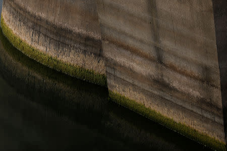 Water levels create different colours on the dam at the Alqueva reservoir, the largest artificial lake in the EU, near Alqueva, Portugal, August 2, 2018. REUTERS/Rafael Marchante