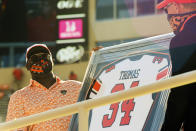 Hall of Fame running back Thurman Thomas is honored as the first inductee into the Oklahoma State football Ring of Honor at half time of an NCAA college football game against West Virginia Saturday, Sept. 26, 2020, in Stillwater, Okla. (AP Photo/Brody Schmidt)