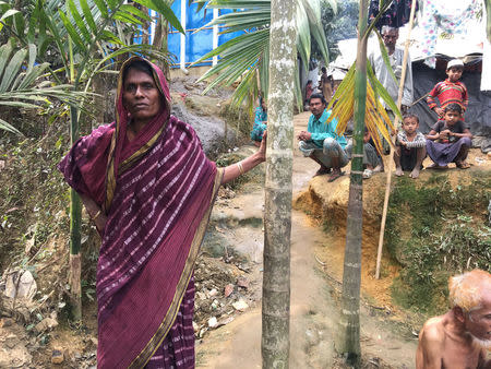 Bangladeshi farmer Jorina Katun stands among the Rohingya Muslims camped out on her land near the Kutapalong refugee camp in the Cox's Bazar district of Bangladesh February 9, 2018. Picture taken February 9, 2018. REUTERS/Andrew RC Marshall