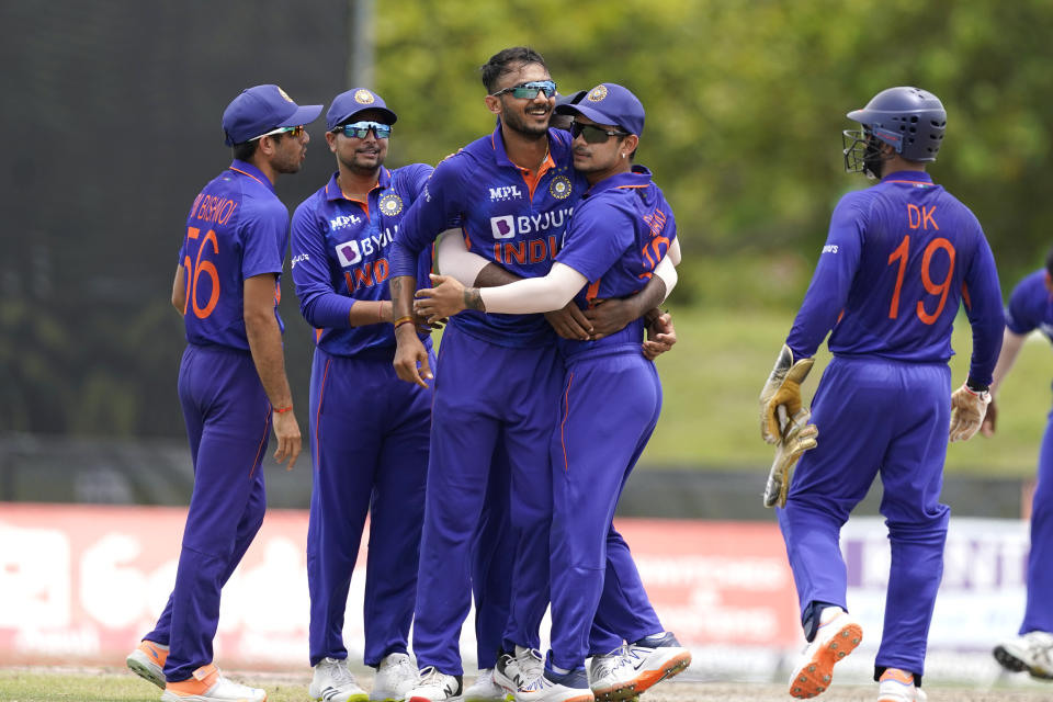 India bowler Axar Patel, center, celebrates with his teammates after bowling West Indies' Sharmath Brooks during the fifth and final T20 cricket match, Sunday, Aug. 7, 2022, in Lauderhill, Fla. (AP Photo/Lynne Sladky)