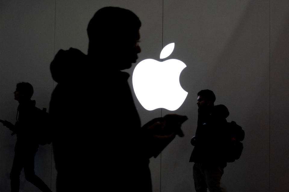 People walk past the Apple Store in the Eaton Centre in Toronto, Ontario, Canada November 22, 2022.  REUTERS/Carlos Osorio