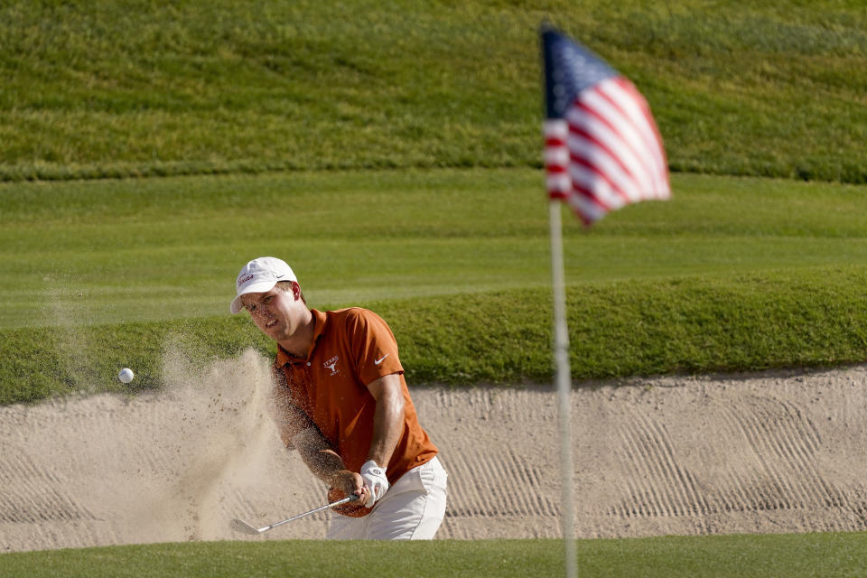 Texas golfer Parker Coody hits from the eighth bunker during the final round of the NCAA college men's stroke play golf championship, Monday, May 30, 2022, in Scottsdale, Ariz. (AP Photo/Matt York)