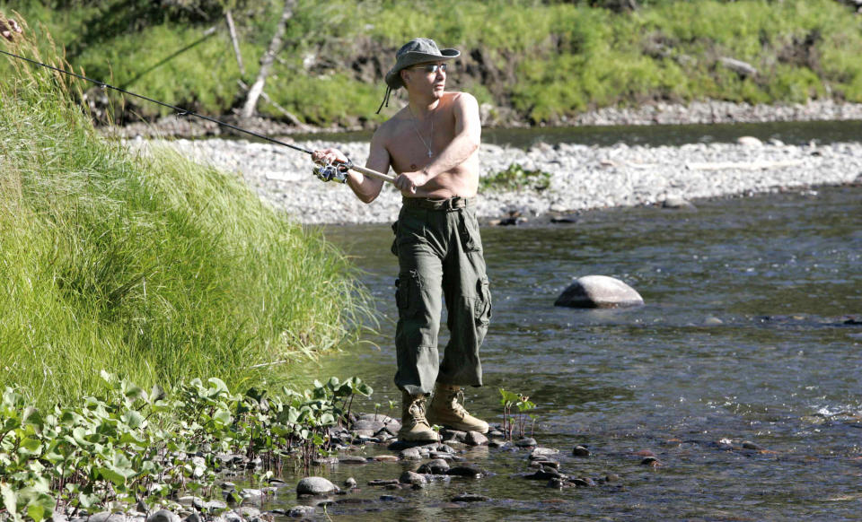 Russian President Vladimir Putin fishing in the headwaters of the Yenisei River of the Russian Tuva republic on the border of Mongolia on Aug. 13, 2007.
