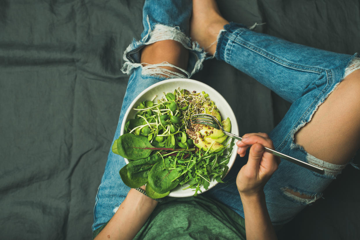 A vegan influencer is receiving a backlash online after being allegedly filmed eating fish [Photo: Getty]