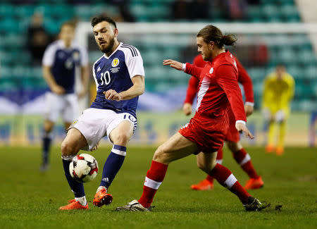 Britain Football Soccer - Scotland v Canada - International Friendly - Easter Road, Edinburgh, Scotland - 22/3/17 Scotland’s Robert Snodgrass in action with Canada’s Samuel Piette. Action Images via Reuters / Jason CairnduffLivepic