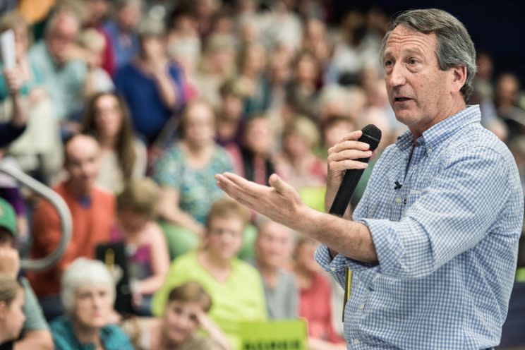 Rep. Mark Sanford (R-SC) addresses the crowd during a town hall meeting March 18, 2017 in Hilton Head, South Carolina. Constituents have been showing up in large numbers across the nation to congressional town hall meetings to voice their concerns. 