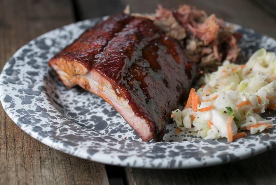 Smoked pork ribs with house made sauce, pulled pork and cole slaw at Southern Smoke BBQ in Garland, N.C. on Friday, June 30, 2017.