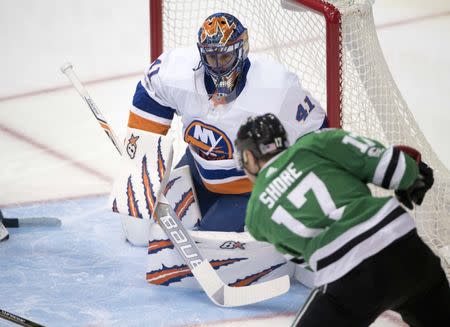 Nov 10, 2017; Dallas, TX, USA; New York Islanders goalie Jaroslav Halak (41) stops a shot by Dallas Stars center Devin Shore (17) during the first period at the American Airlines Center. Mandatory Credit: Jerome Miron-USA TODAY Sports