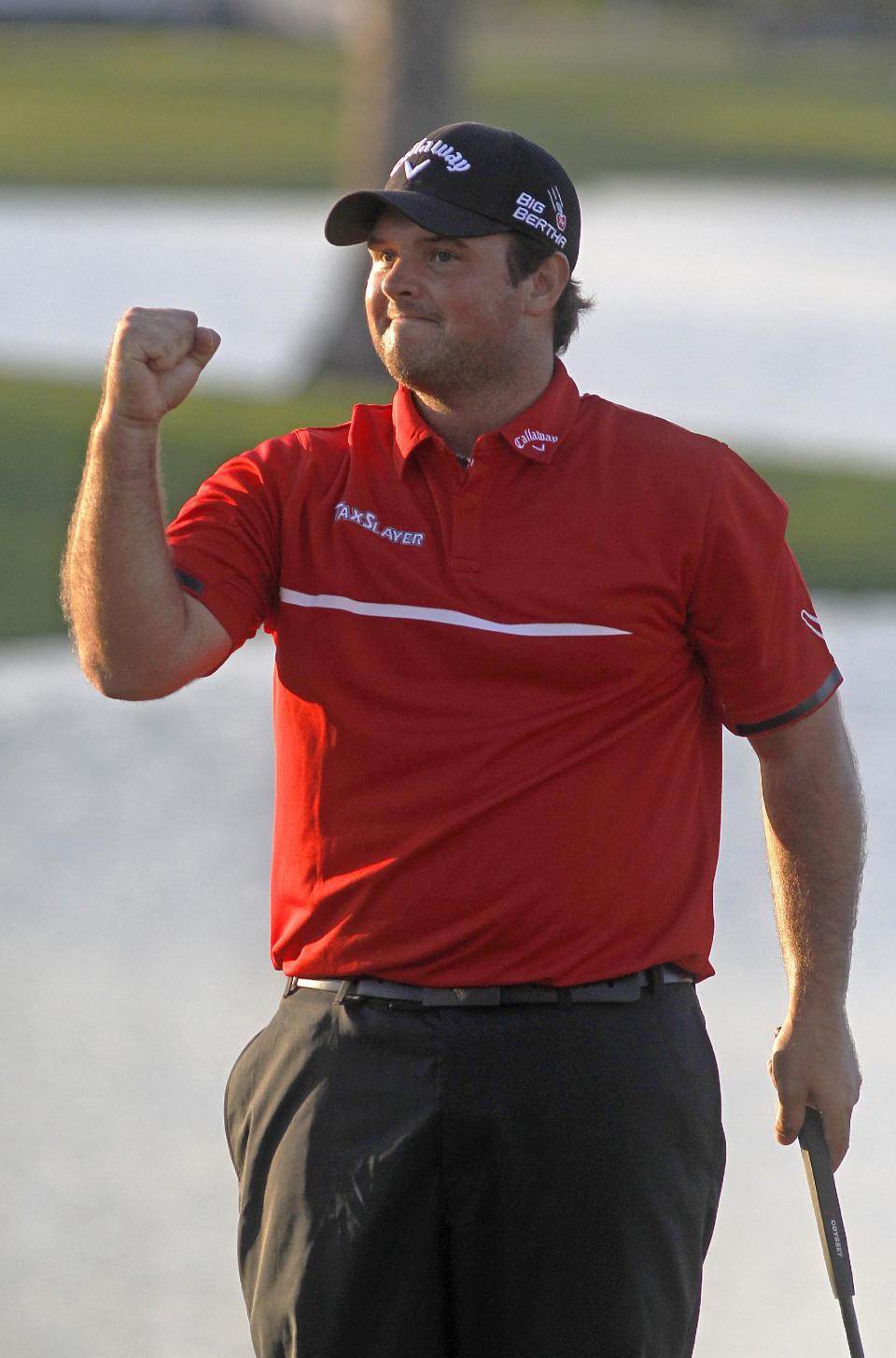 Patrick Reed celebrates his one stroke victory during the final round of the Cadillac Championship golf tournament Sunday, March 9, 2014, in Doral, Fla. Reed won the tournament with a four-under-par 284. (AP Photo/Marta Lavandier)