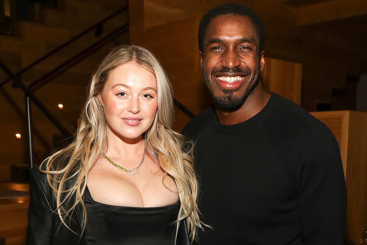 <p>Rick Kern/Getty</p> Iskra Lawrence (L) and Philip Payne in 2022