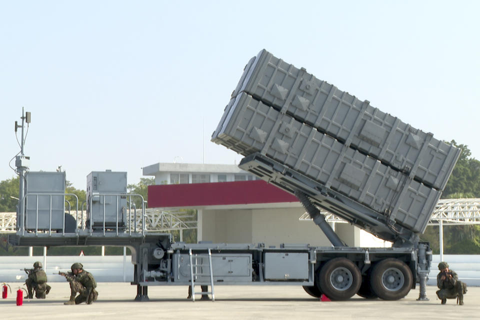 In this image taken from video, Taiwanese soldiers guard the "Brave Wind III" anti-air missiles truck in Kaohsiung, Southern Taiwan on Wednesday, Jan. 31, 2024. Taiwan is holding spring military drills following its recent presidential election and amid threats from China, which claims the island as its own territory that it is determined to annex, possibly by force. (AP Photo/Johnson Lai)