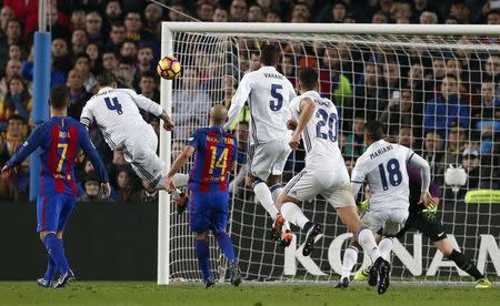 Football Soccer - Barcelona v Real Madrid - Spanish La Liga Santander- Nou Camp Stadium, Barcelona, Spain - 3/12/16. Real Madrid's Sergio Ramos scores a goal during the "Clasico". REUTERS/Albert Gea