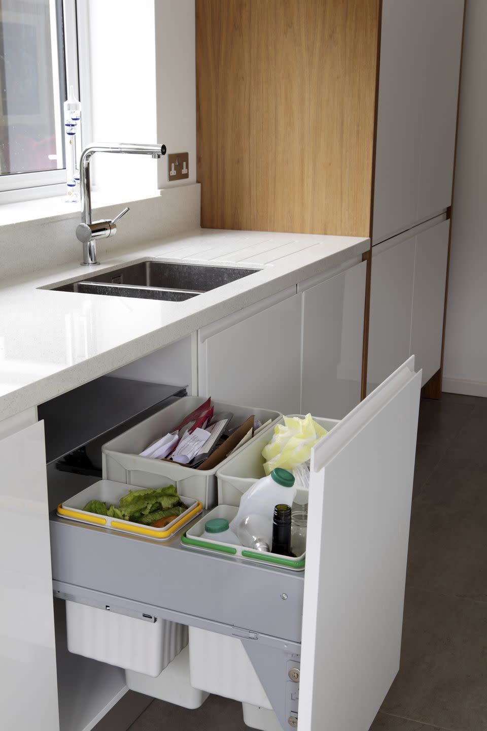 Keep Trash In A Pull-Out Drawer