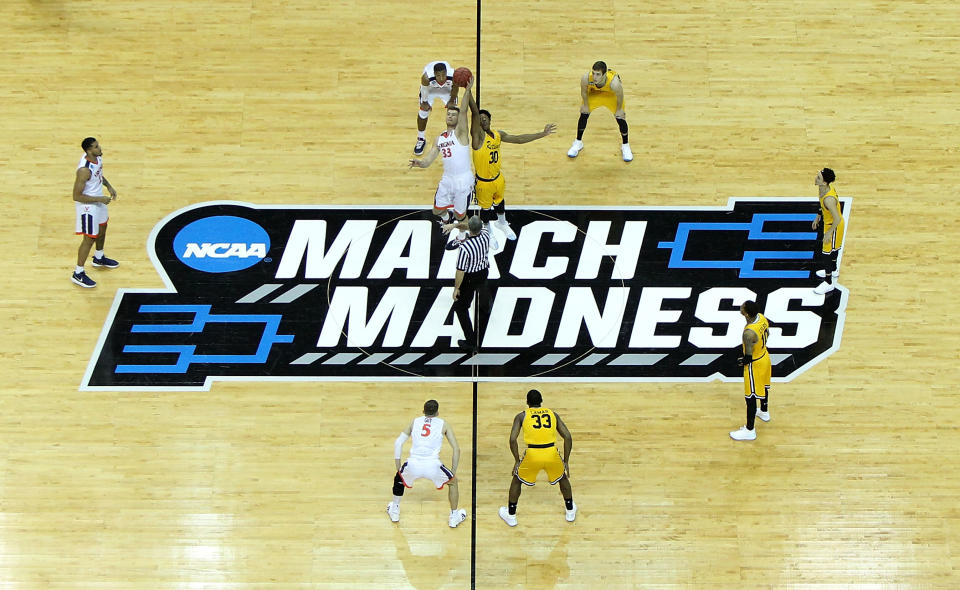 The Virginia Cavaliers tip off against the UMBC Retrievers in the first round of the 2018 NCAA Men’s Basketball Tournament at Spectrum Center on March 16, 2018 in Charlotte, North Carolina.