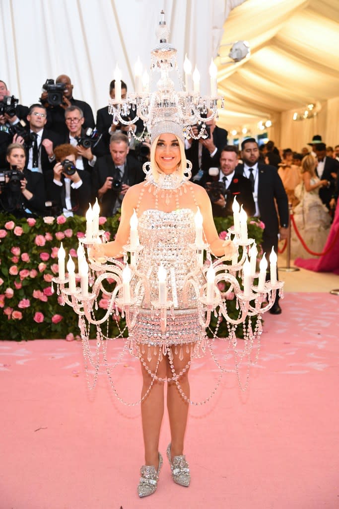The Met Gala — which raises money for the Anna Wintour Costume Institute at the Metropolitan Museum of Art — often features celebrities in unusual outfits. In 2019, Katy Perry wore a chandelier-inspired dress. Getty Images for The Met Museum/