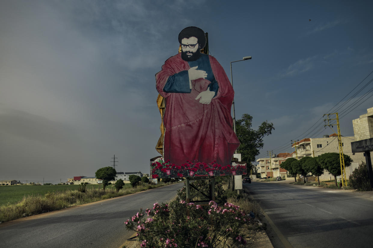 A cardboard cutout depicts Abbas al-Musawi, a co-founder and former leader of Hezbollah, along a road near Baalbeck, Lebanon, May 17, 2024. (Diego Ibarra Sanchez/The New York Times)