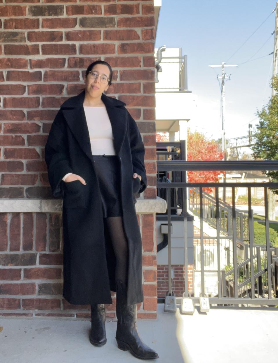 Wearing a Reformation skirt, coat and bodysuit (plus some tall cowboy boots for fun).