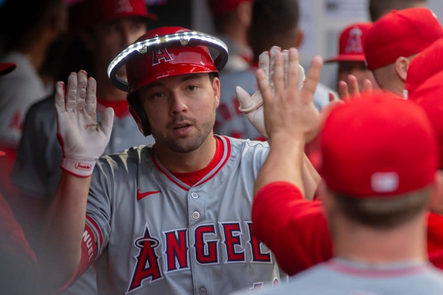 Los Angeles Angels’ Nolan Schanuel is congratulated by his teammates after hitting a solo home run off Cleveland Guardians starting pitcher Tanner Bibee during the third inning of a baseball game in Cleveland Friday, May 3, 2024. (AP Photo/Phil Long)