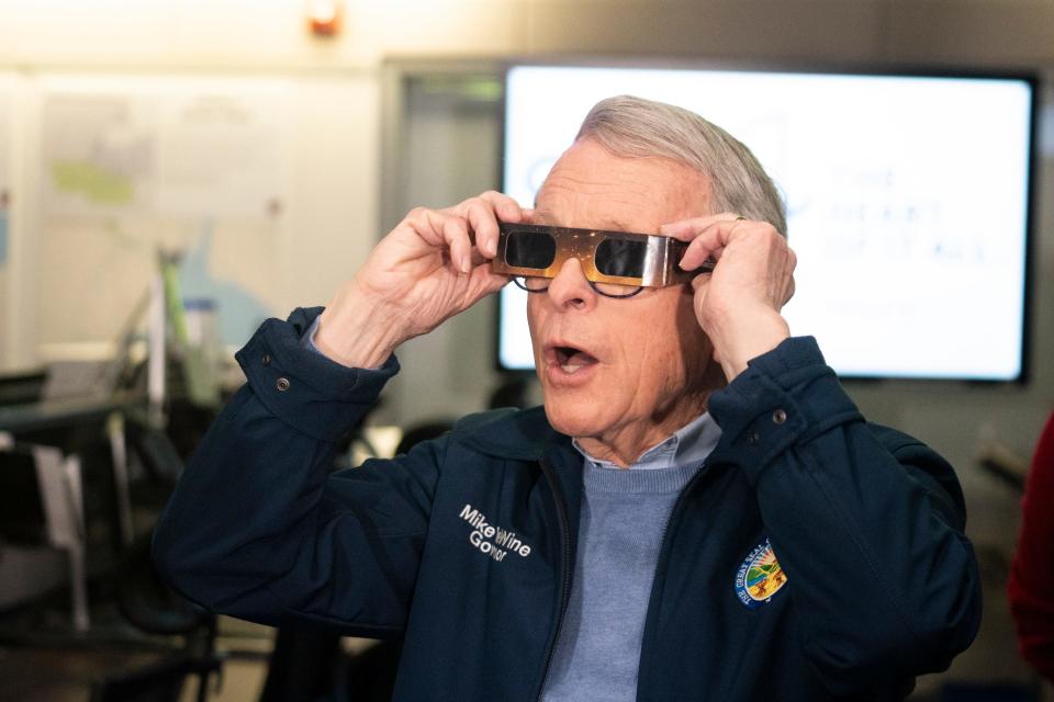 Gov. Mike DeWine, urges people to wear eclipse glasses, but not while driving, and to "pack extra patience" for the traffic that is expected around the solar eclipse.
